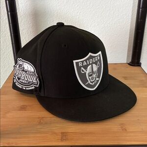 New Era Black Raiders Hat